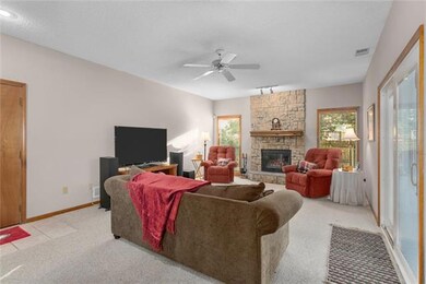 Lower Level family room with fireplace. 