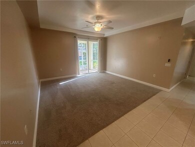 Empty room featuring a ceiling fan and light color