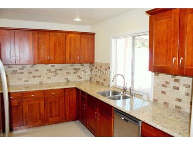 Kitchen. granite counter top with back splash.