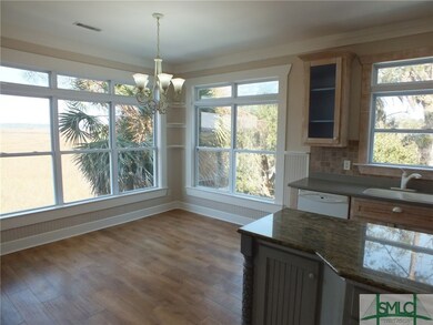 Expansive views and lots of natural light fill thi