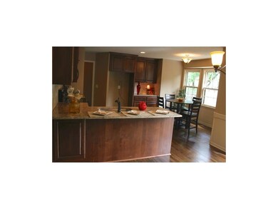open kitchen with eat in and dinning room area ope