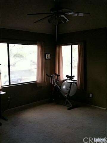 Third bedroom currently used as a workout room and