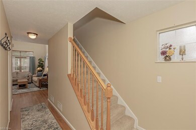 Main level hallway to the family room and stairs l