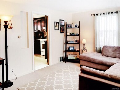 Living room, looking toward kitchen