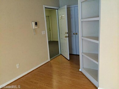 Interior Space/Layout. Front entrance into condo.