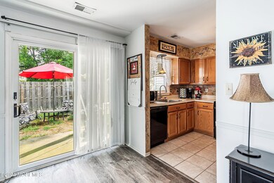 07-Dining to Yard and Kitchen