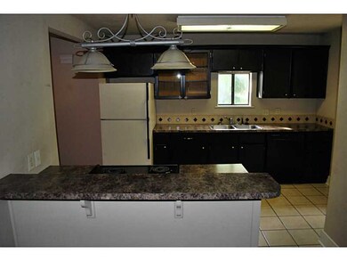 1009 N 11th St, Rogers, AR 72756 - photo 2