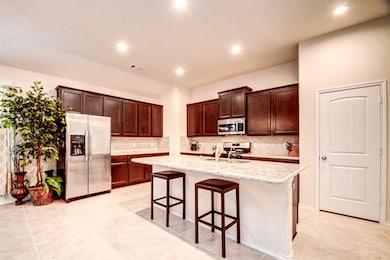 The gourmet kitchen is a space you will love!