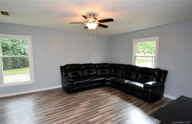 Living Room.  Beautiful, new flooring.