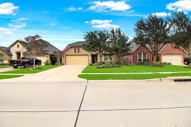 Professionally manicured landscaping front and back. This Home is located in a side walk community with tons of amenities. Driveway to a 2 car garage with automatic remote door opener. Pleasant walkway to the arch entry way covered porch.