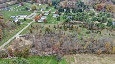 Aerial view of property's location featuring rural landscape