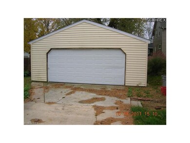 The two plus car garage is just steps from the rea