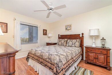 Bedroom with light hardwood / wood-style floors an