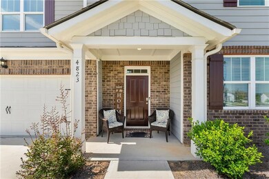 Property entrance with a garage
