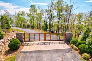 View of gate with a fenced front yard