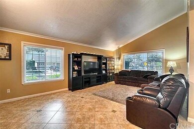 Large Living Room Enhanced With Vaulted Ceiling, C