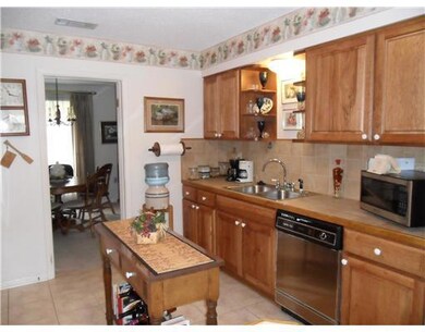 Kitchen. Plenty of counter space.  Shelving on eac