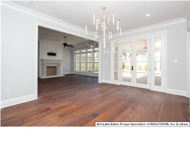 The dining room is finished with a beautiful white