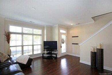 View of Living area with plenty of light and foyer