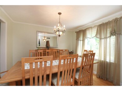 Formal dining room with new chandelier, crown mold