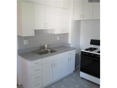 KITCHEN OFFERS UPDATED CABINETS AND COUNTERTOP