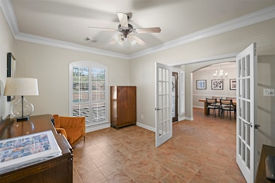 Just off the entry, you will find this private study with double French Doors, offering the perfect place for a home office, music room or reading room!