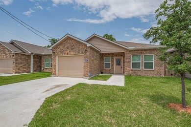 Charming brick home, neat lawn, and a welcoming fr