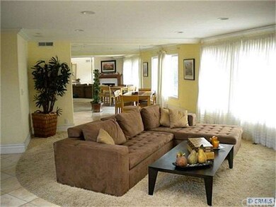 Comfortable Living and Dining Rooms with Fireplace