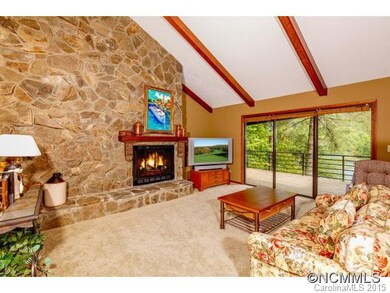 Great Rm w/full Stone wall FP