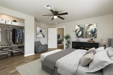 Bedroom staged with furniture