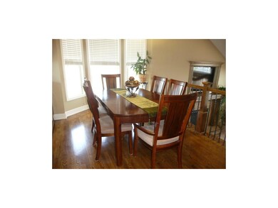 Spacious Dining room with hardwoods