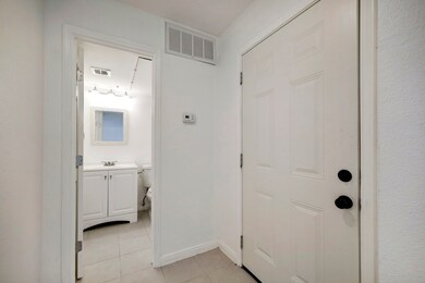 Entrance door and half bath down stairs