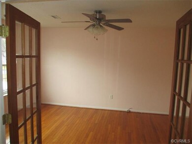 Formal Living Room or hoe office with the privacy created by double french doors!