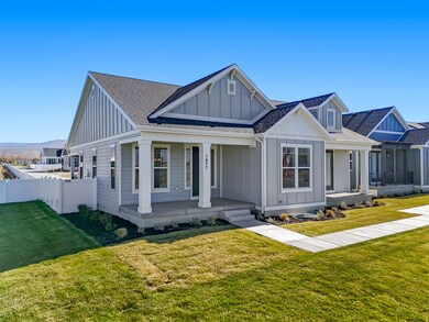 View of front of home featuring board and batten siding, a shingled roof, and a porch