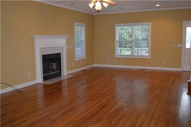 Living room has a gas fireplace that's perfect to gather around on those cold winter nights.