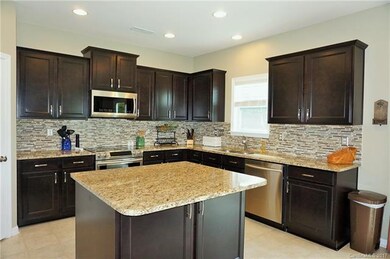 SAMSUNG SS APPLIANCES / GRANITE TOPS / TILE BACKSP