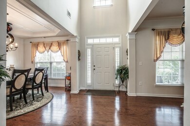 Foyer showing access to the formal living room and dining room.