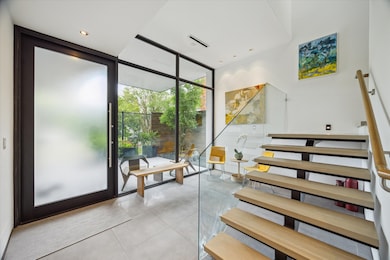 Stunning main entry with frosted panel door and fl