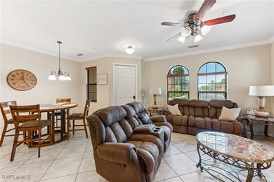 Living room featuring light tile patterned floorin