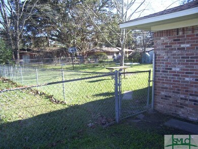 Backyard - Clean, fenced-in backyard with entrance