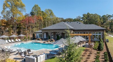 Community pool with a patio area