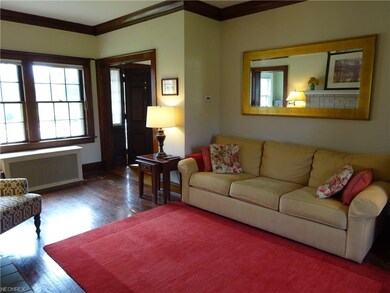 The main level has beautiful natural woodwork, inc