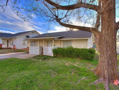 Ranch-style house featuring a front lawn
