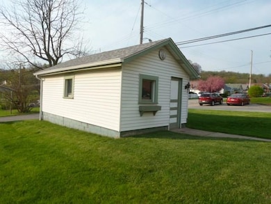 DETACHED ONE CAR GARAGE.