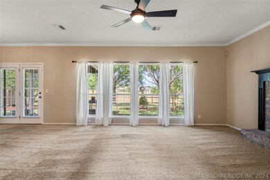 Large living area with fireplace and a great view