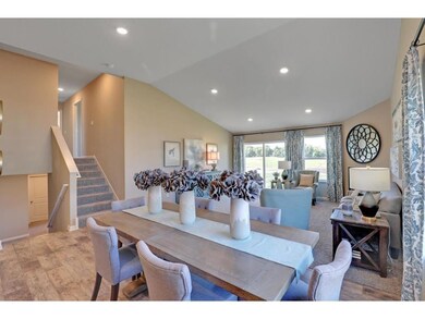 Centered within the main level, the home's dining 