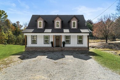 The large covered front porch allows for peaceful mornings enjoying a cup of coffee.