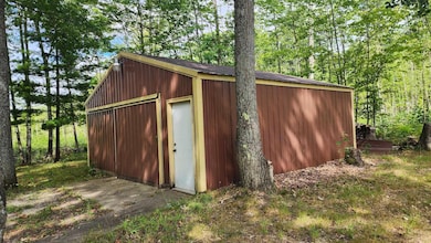 1385 N Hubbard Lake Rd, Spruce, MI 48762 - photo 7