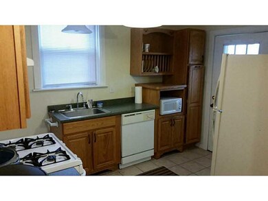 Exterior Front. Apt B Kitchen