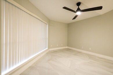 Newly renovated condo with porcelain flooring thro